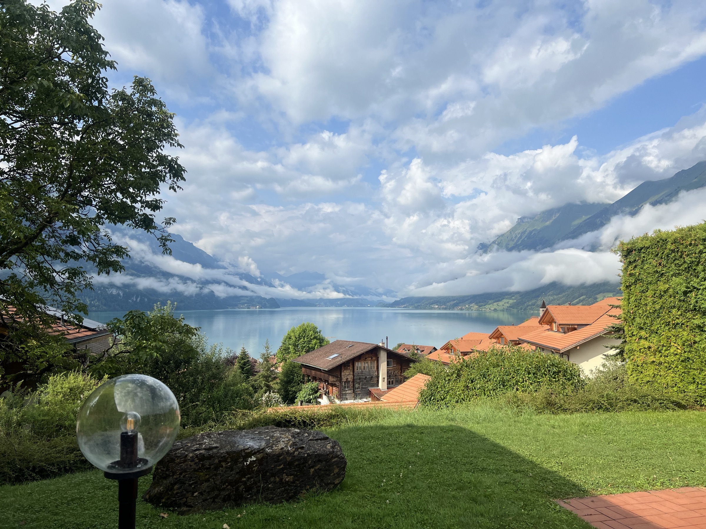 Panoramic view from Brienz Villa over turquoise Lake Brienz and the Alps